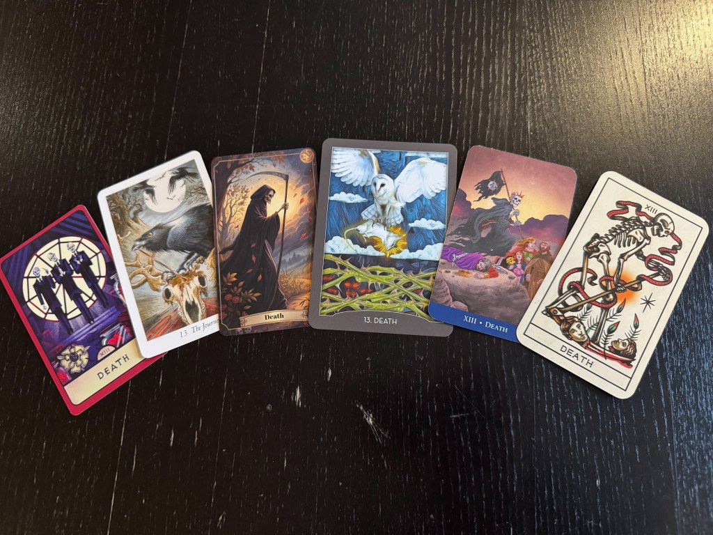 Spread of 6 cards from different tarot decks